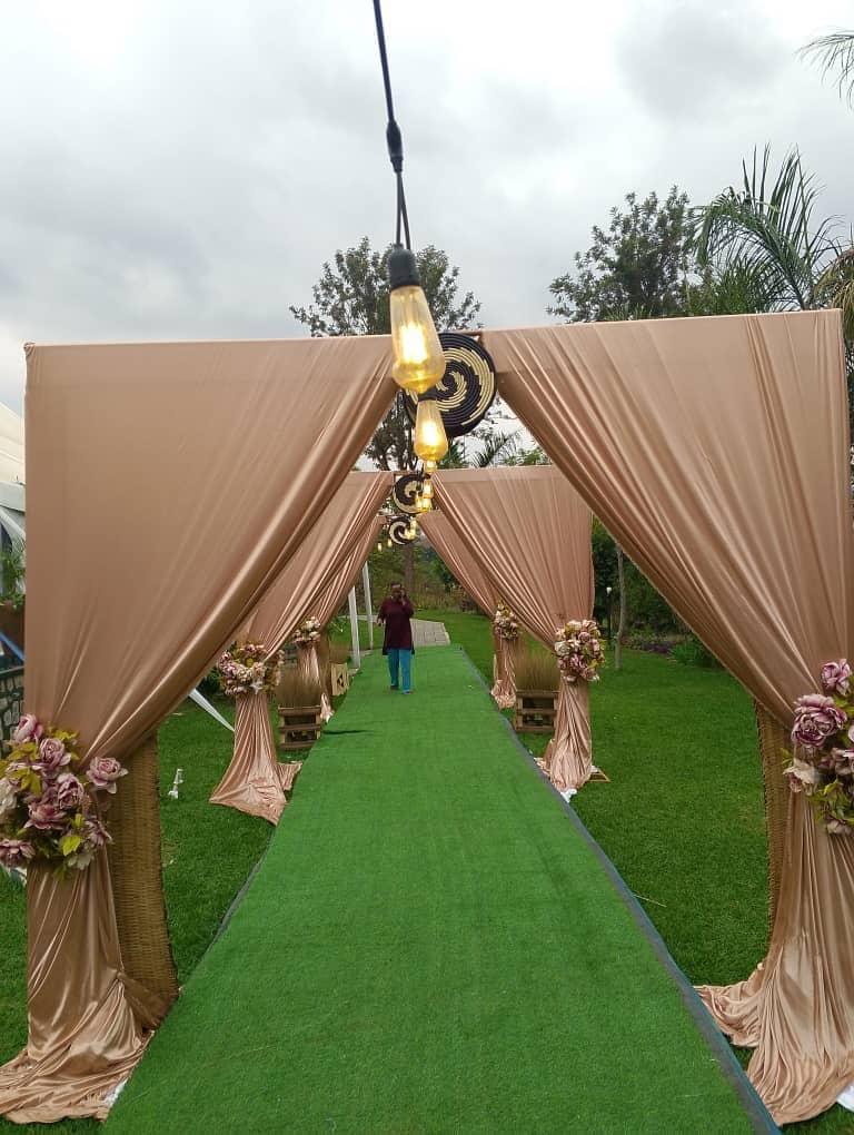 Garden entrance with draped canopy and florals