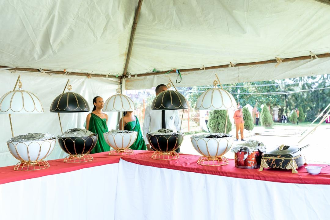 Catering station with ornate serving vessels